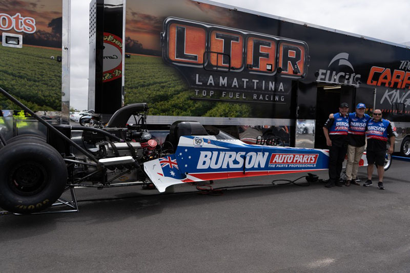 Men with Burson dragster car